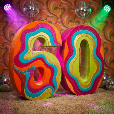 Large, colorful psychedelic numbers 60 set against a retro flower-patterned backdrop.